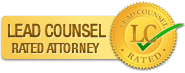 A yellow Badge with a green tick endorsing Kiel J. Roeschke as a lead counsel rated attorney